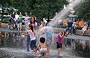 MILLENNIUM PARK. Doccia per tutti, bambini e adulti alla Crown Fountain