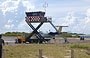 GRAN ROQUE. La caratteristica torre di controllo della pista di atterraggio degli aerei turistici visibile dal molo 
