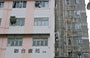 MONG KOK. Verso Prince Edward gli alti condomini stipati e fatiscenti caratterizzano questo pezzo di città cinese 