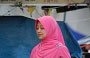 JERTEH. Donne musulmane indossano veli che ricoprono interamente i capelli, il collo, le spalle e il petto e ampi vestiti che coprono braccia e gambe