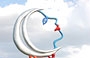 GIARDINO DEI TAROCCHI. La Luna argentea, scultura skinny sostenuta dal granchio rosso posta al centro di una radura