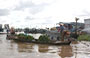 DELTA DEL MEKONG. Ortaggi sulle barche del mercato galleggiante di Cai Rang