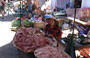 DELTA DEL MEKONG. Banchi di carne esposta al mercato cittadino di Cai Rang
