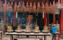 HO CHI MINH CITY. Suggestive spirali di incenso pendono dal soffitto della Pagoda di Thien Hau mentre lucidi vasi di ottone bruciano bastoncini di incenso