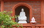 HANOI. Statua in marmo di Buddha all'interno di una alcova della Lotus Tower